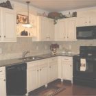Cream Cabinets With Black Appliances