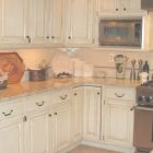Cream Distressed Kitchen Cabinets
