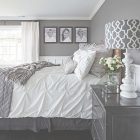 Grey And White Bedroom With Black Furniture