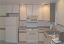 Painting Particle Board Kitchen Cabinets