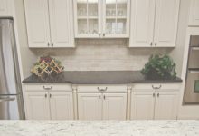 Antique Brown Granite With White Cabinets
