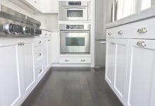 Do Kitchen Cabinets Go In Before Flooring